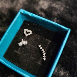 Moissanite Nose Rings in sterling silver. Priced as each.